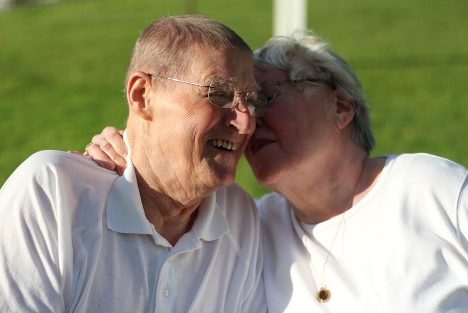 grandparents outdoors snuggling