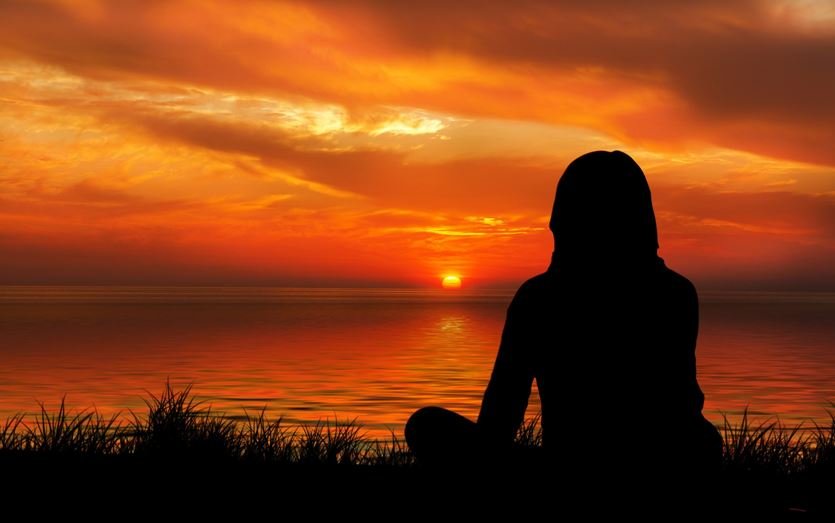 sunset-woman silhouette meditation